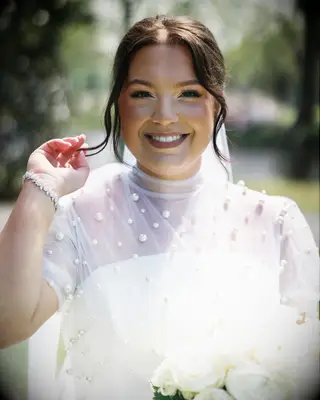 Simple low bun high neck wedding dress bridal hairstyle