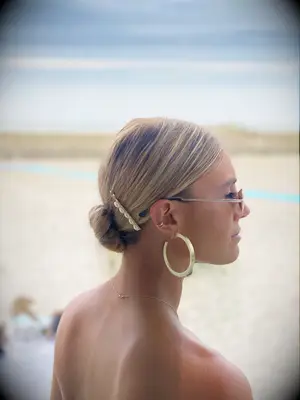 Sleek bun hairstyle for your wedding day