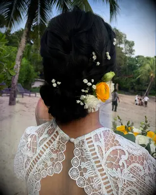 Gorgeous braided bun with flowers