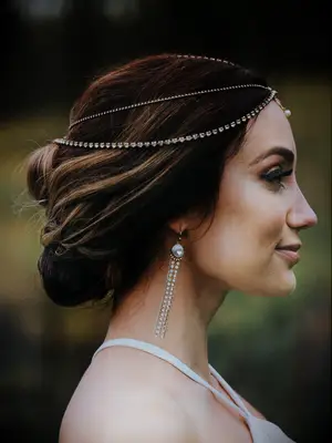 boho wedding hair loose low updo with beaded headpiece
