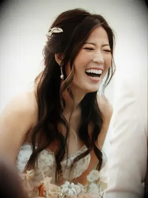 boho wedding hair half up half down with hair piece and pieces out front