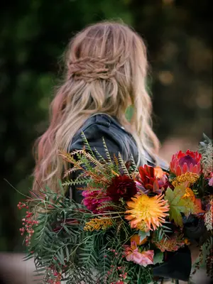 boho wedding hair loose waves with braided barrette