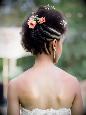 boho wedding hair reverse braided updo with flowers