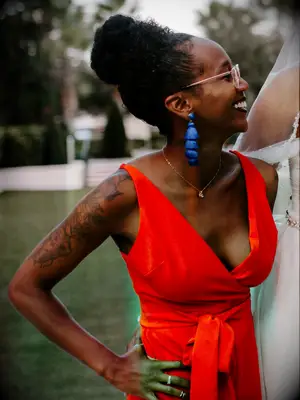 boho wedding guest hair messy top knot