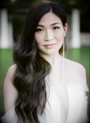 Side waves with middle part wedding hairstyle