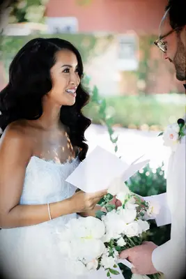 Full curls with side part wedding hairstyle