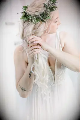 Half-up with flower crown wedding hairstyle