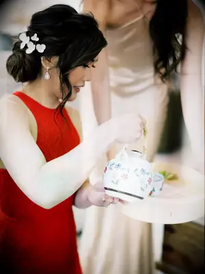 Low side bun with twist wedding hairstyle