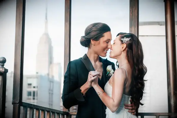 Deep side part with hair clip wedding hairstyle