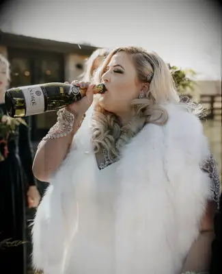 Curls with side pin wedding hairstyle