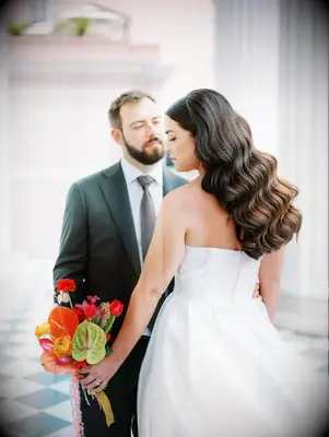 Front hair slicked back wedding hairstyle