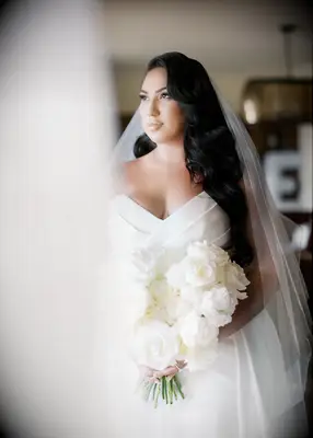 Long soft waves with side part wedding hairstyle