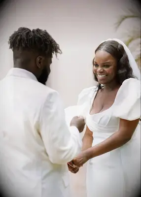 Glamorous waves with middle part formal wedding hairstyle