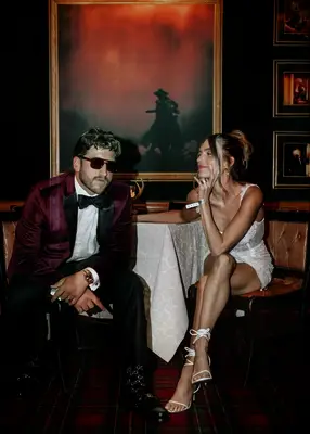 Tight tousled bun formal wedding hairstyle