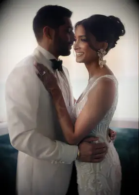 Tousled French twist formal wedding hairstyle