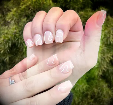 Thin white swoops bridal nail inspiration