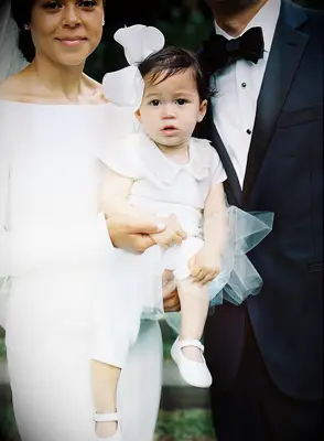 Flower girl with large bow accessory