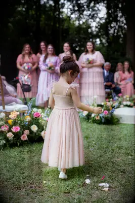 Elegant bun flower girl hairstyle
