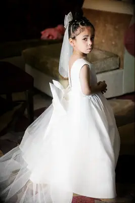 Top knot flower girl hairstyle