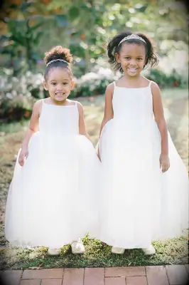 Flower girlf hairstyle with bejeweled accessories 