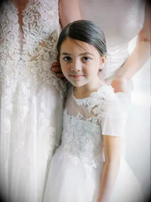 Elegant chignon flower girl hairstyle