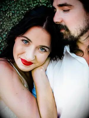 wedding makeup dark lashes bright red lipstick