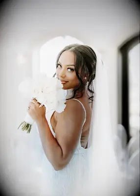 Elegant bridal updo wedding hairstyle with veil