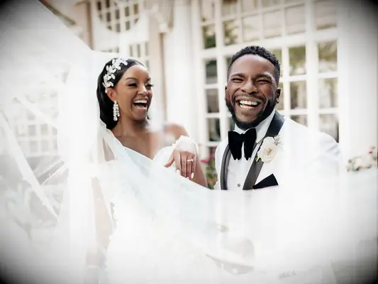 Bride wearing hair accessory with wedding veil