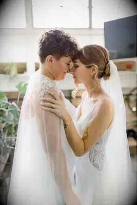 Low bun wedding hairstyle with veil