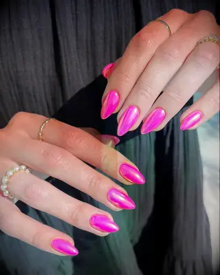 Barbie pink chrome wedding nails