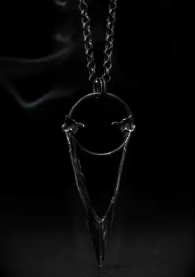 Silver magpie jewellery beak necklace thorn and claw