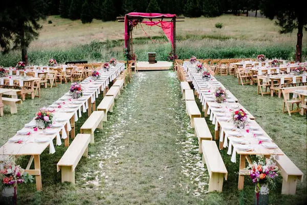 Ceremony arbor with pink draping
