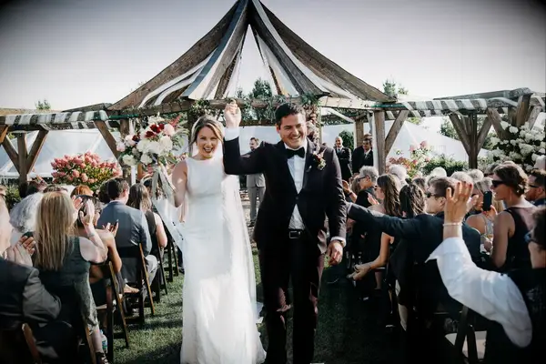 Draped wood wedding arbor