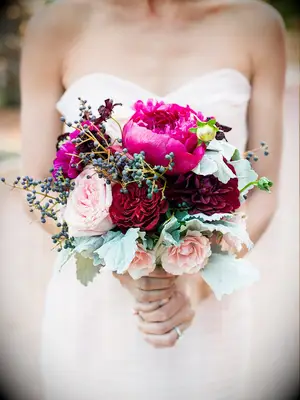 Bright wedding bouquet with peonies and garden roses