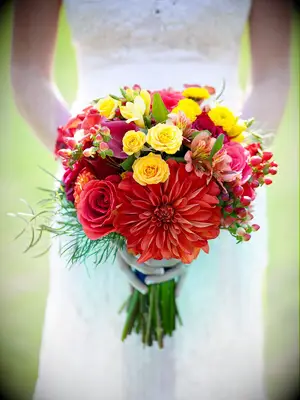 Red and yellow bouquet with dahlias, roses and button mums