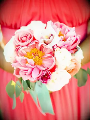 Bright bridesmaid bouquet with peonies, roses and lilies