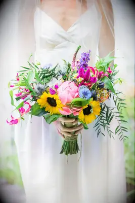Vibrant sunflower and wildflower bouquet