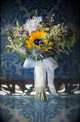 Sunflower bouquet with thistles
