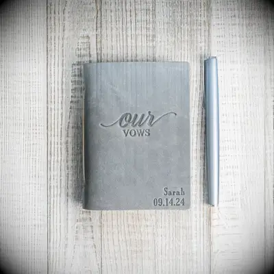 leather vow book embossed with our vows and the wedding date