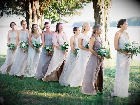 Bridesmaids watching vows during wedding ceremony