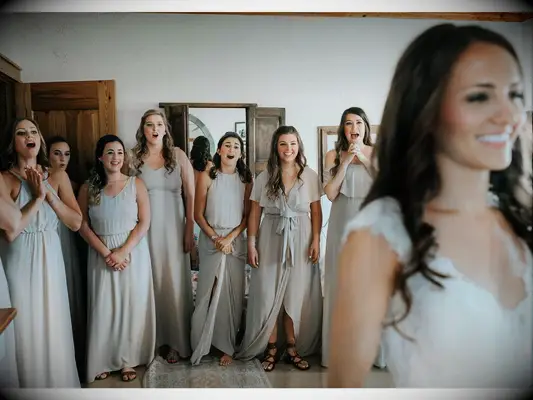 First look with bridesmaids on wedding morning