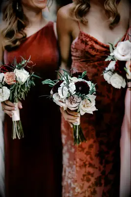 Simple winter wedding bouquet with burgundy flowers