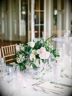 elegant greenery wedding centerpiece with white roses