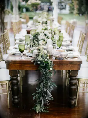 eucalyptus table runner on bare wooden table