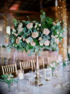 tall greenery wedding centerpiece with eucalyptus and blush roses
