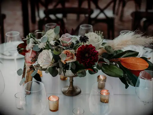 dark moody bouquet with boho details