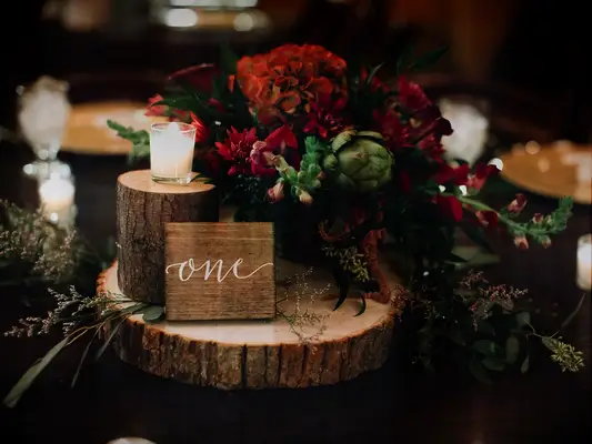 Rustic Wintry Red Centerpiece on Wooden Pedestal