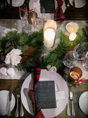 winter wedding centerpiece greenery and candles