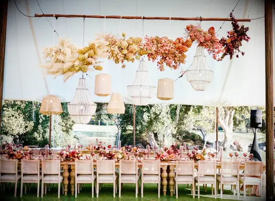 Low to High Chandeliers wedding lighting idea