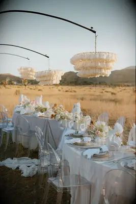 Neutral serpentine table scape in desert wedding venue